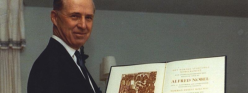 Borlaug pictured with his Nobel Prize.